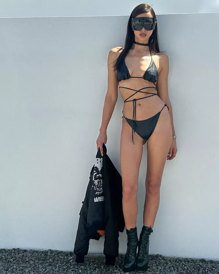 Irina Shayk Paired Her Midriff-Flossing Black Leather Bikini With Lace-Up Platform Boots