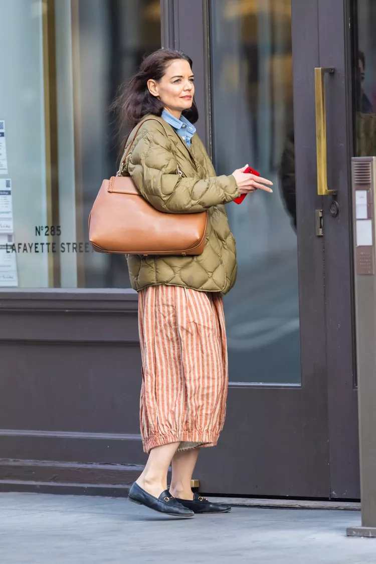 Katie Holmes Just Proved This Polarizing Coat Trend Is Still in for Spring 2023