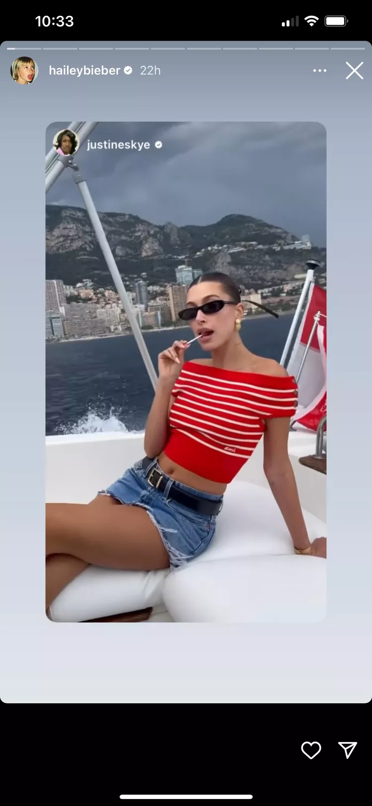 Hailey Bieber Nailed the Nautical Theme in an Off-the-Shoulder Striped Sweater and Denim Miniskirt