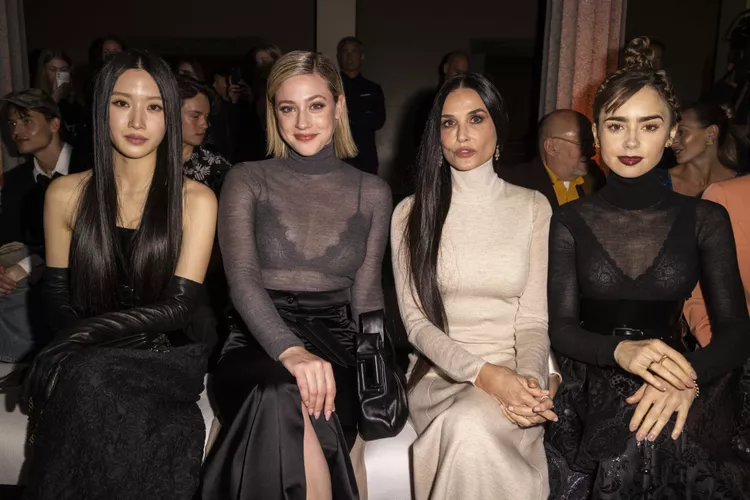 Lily Collins Expertly Styled Her Statement Skirt With a Sheer Turtleneck and a Corset Belt Lily Collins Expertly Styled Her Statement Skirt With a Sheer Turtleneck and a Corset Belt