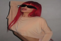 Kylie Jenner Paired a Fiery Red Wig With Sheer Pink Pants and an Underboob-Baring Crop Top