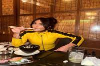 Kim Kardashian Channeled 'Kill Bill' in a Yellow Moto Jacket and Skin-Tight Pants