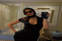 Kendall Jenner Updated Audrey Hepburn's Signature Style in a Plunging LBD and Sheer Headscarf