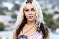 Miley Cyrus Matched Her High-Cut Gold Bathing Suit to Her Mirrored Shades