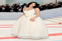 Dua Lipa Arrived at the 2023 Met Gala in Claudia Schiffer's Iconic 1992 Chanel Bridal Tweed Gown