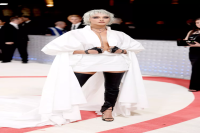Cara Delevingne's 2023 Met Gala Look Included a Shaggy Platinum Bob and Thigh-High Leg Warmers