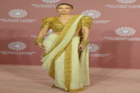 Gigi Hadid Added Two Armloads of Bangles to Her Blingy Sari
