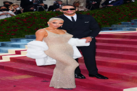 Kim Kardashian's 2023 Met Gala Look Was "Dripping" in Real Pearls