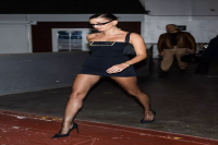 Hailey Bieber Traded in Her Signature LBD for a Black Halter Top and Matching Slouchy Trousers