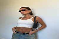 Hailey Bieber Wore a Tiny White Tank Top With the Baggiest Puddle Pants