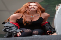 Megan Fox Wore a Plunging Sheer Catsuit to a Machine Gun Kelly Concert in Berlin