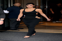 Khloé Kardashian Paired Her Totally See-Through Two-Piece Set With a Giant Metal Scarf